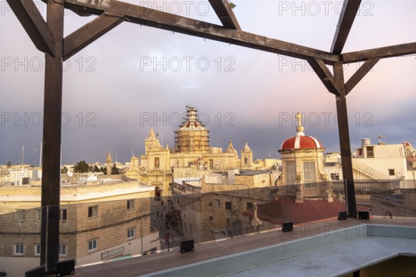 Rabat skyline with St Paul church dome on the left during sunset, Rabat Mdina, Malta