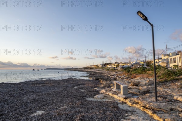 Peaceful Coastal Village at Sunset in Malta
