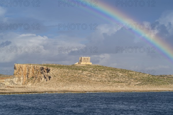 Amazing view of rainbow after the rain above Comino island, Malta