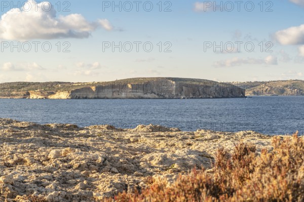 Comino island seen from northern part of Malta, Armier Bay, Malta