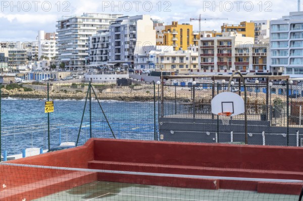 Saint Paul's Bay city view with sport zone in the foreground, Malta