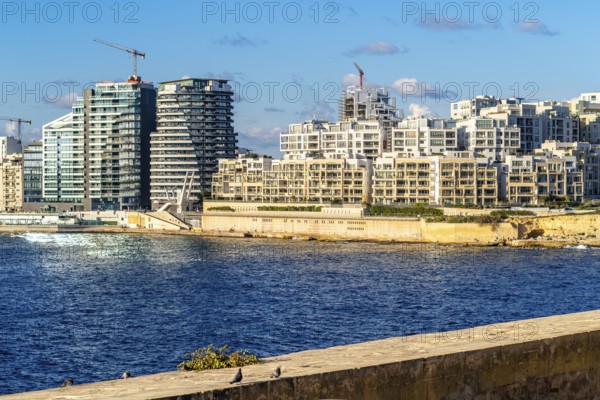 View of seafront modern part of capital city La Valletta, Malta