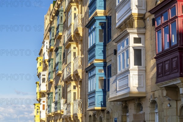 Amazing historic houses with colorful wooden balconies in La Valletta, capital city of Malta