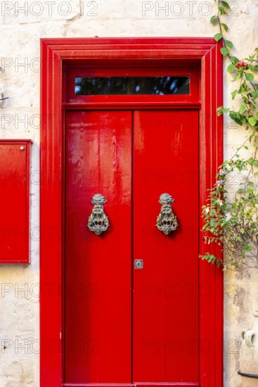Wooden red doors in La Valletta, capital city of Malta