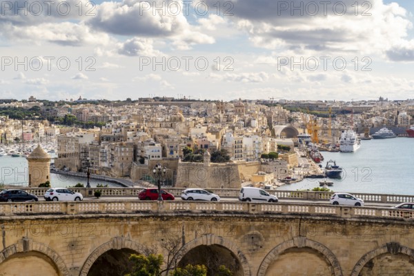 Beautiful view of bridge in capital city and historic architecture of Valletta, Malta