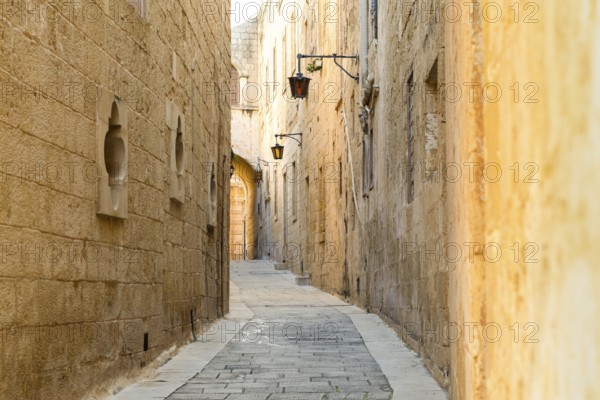 Street view with lanterns in historic L-Imdina, Rabat, Malta