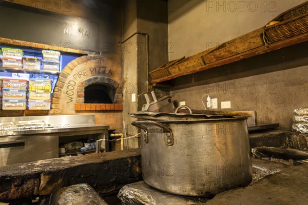 Big silver pot in South African restaurant. It's a feast for the senses. From street food to fine dining, every flavor tells a story of culture, community, and creativity