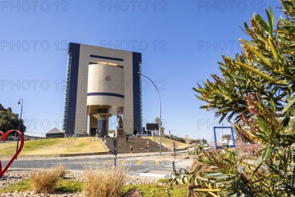 The Independence Memorial Museum in Windhoek, Namibia, honors Dr. Sam Nujoma and the country's journey to independence. His statue overlooks the city, and inside, exhibits tell Namibia's story