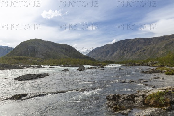 River Sjoa in front of the rock face of Mount Besseggen, Jotunheimen National Park, Tessanden, Innlandet, Norway