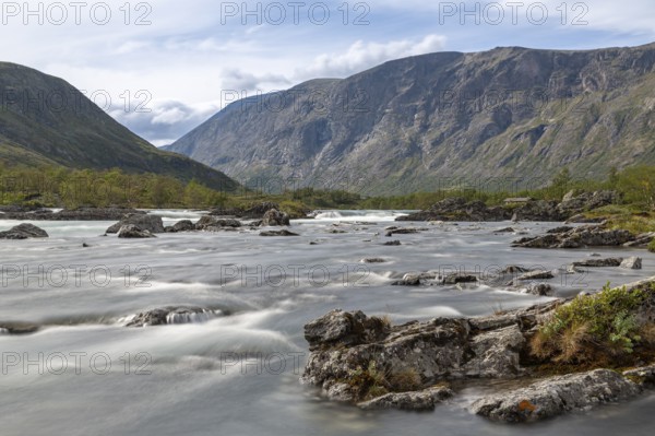 River Sjoa in front of the rock face of Mount Besseggen, Jotunheimen National Park, Tessanden, Innlandet, Norway