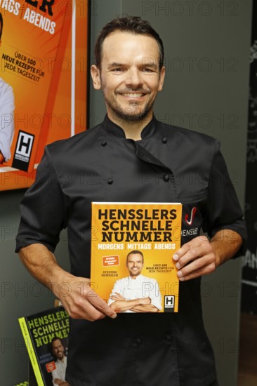 Chef Steffen Henssler at the presentation of his new cookbook HENSSLERS SCHNELLE NUMMER - mornings, lunchtimes, evenings in Henssler's kitchen, Hamburg, Germany