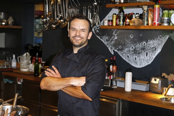 Chef Steffen Henssler at the presentation of his new cookbook HENSSLERS SCHNELLE NUMMER - mornings, lunchtimes, evenings in Henssler's kitchen, Hamburg, Germany