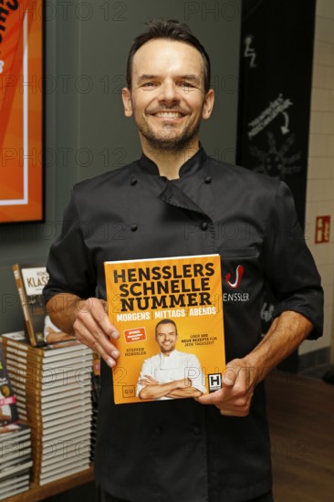Chef Steffen Henssler at the presentation of his new cookbook HENSSLERS SCHNELLE NUMMER - mornings, lunchtimes, evenings in Henssler's kitchen, Hamburg, Germany