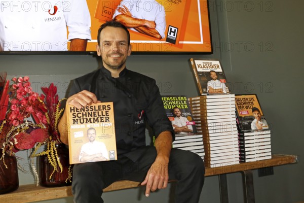 Chef Steffen Henssler at the presentation of his new cookbook HENSSLERS SCHNELLE NUMMER - mornings, lunchtimes, evenings in Henssler's kitchen, Hamburg, Germany