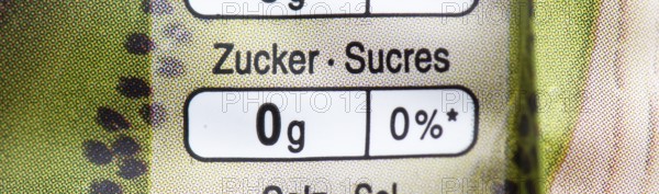 Quantity and percentage of the recommended daily intake of the nutrient sugar on a packet of cornflakes