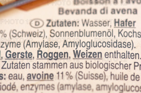 List of ingredients on a carton of oat milk. Focus on enzymes