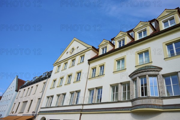 Multi-storey building under a bright blue sky with skylights, Regensburg, Bavaria, Germany