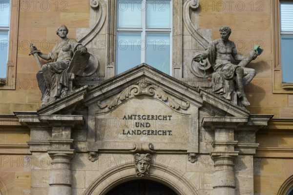 Historic façade of a court building with decorative sculptures and classical architecture, district court, regional court, Regensburg, Bavaria, Germany
