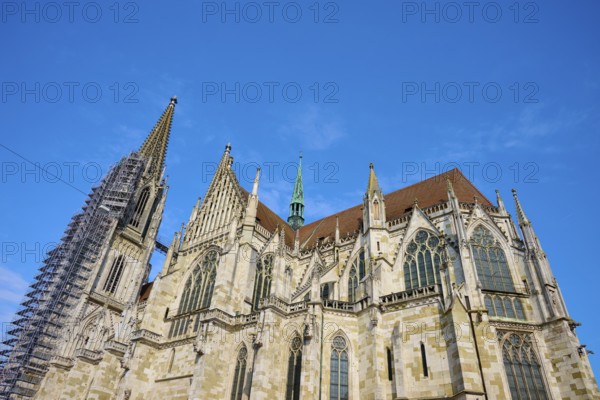 Majestic Gothic cathedral with numerous towers and a complex façade, St Peter's Cathedral, Regensburg, Bavaria, Germany