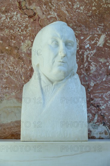 Reflective marble bust of Jean Paul, classical style against a red background, Walhalla, Donaustauf, Regensburg, Bavaria, Germany