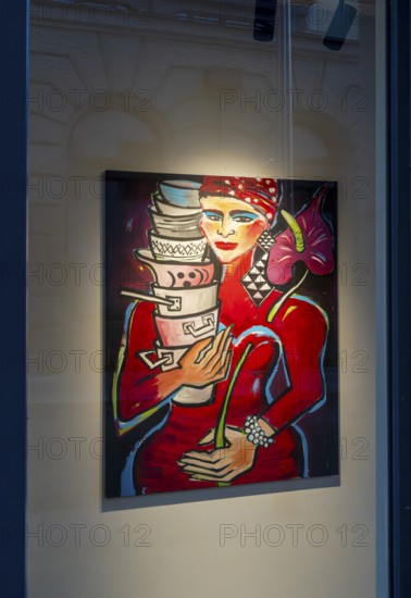View through a shop window onto a painting, Berlin, Germany