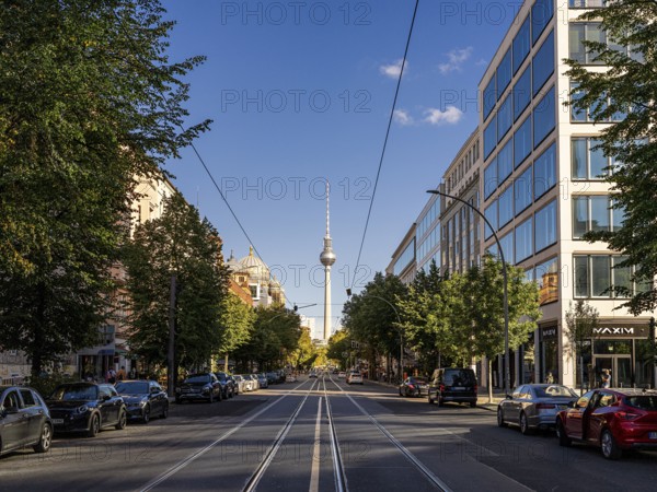 Oranienburger Straße with a view of the television tower at Alexanderplatz, Berlin, Germany