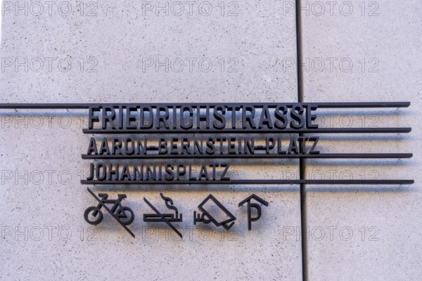 Modern street signage on a house wall, Berlin, Germany