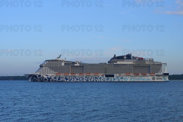 Cruise ship, MSC Euribia, sailing through the vastness of the ocean under a blue sky, Heikendorf, Plön district, Kiel Fjord, Schleswig-Holstein, Germany