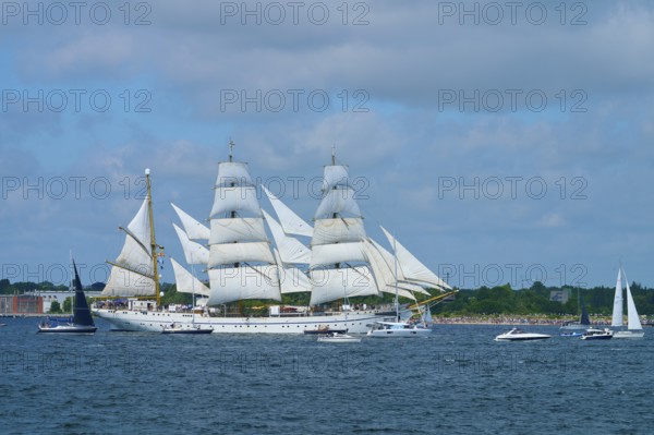 An impressive tall ship Gorch Fock with white sails off the coast, Windjammer Parade Kiel 2025, Friedrichsort lighthouse, Plön district, Kiel Fjord, Schleswig-Holstein, Germany
