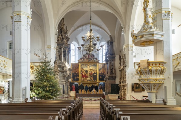 Interior of the Herderkirche with the altarpiece Christ on the Cross by Lucas Cranach in Weimar, Thuringia, Germany