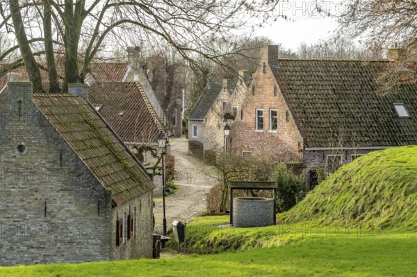 Traditional houses in the village of the inhabited former fortress of Bourtange, Groningen, Netherlands