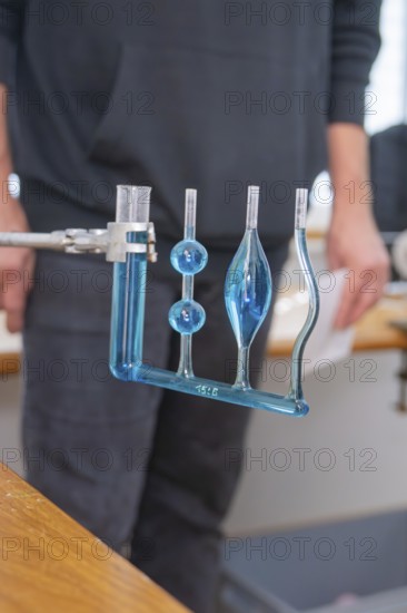 Blue-filled glass tubes in a laboratory for a scientific experiment, Youth Research Centre
