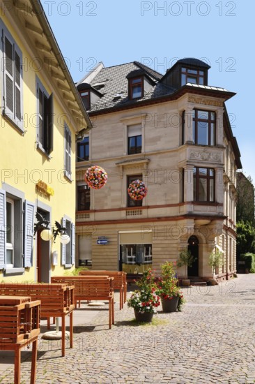 Ettlingen, Germany - August 13th 2025: Beer and wine bar in called 'GoldBlond' in Ettlingen old town with summer outdoor seating