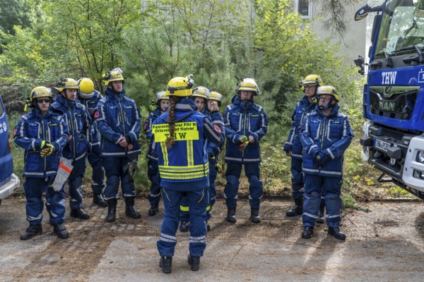Civil defence exercise scenario, after a drone attack on a residential area, emergency services clear the area, at the large-scale exercise FÜLEX25, of the THW, Technisches Hilfswerk, Landesverband North Rhine-Westphalia, on 4 weekends over 3500 volunteers from the 127 North Rhine-Westphalia local associations practice many different deployment scenarios, from the field of disaster control and civil defence