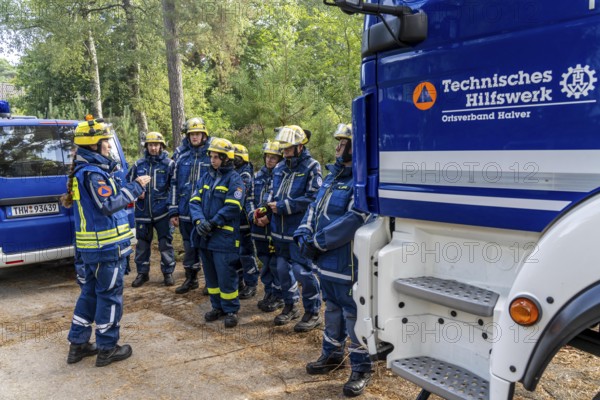 Civil defence exercise scenario, after a drone attack on a residential area, emergency services clear the area, at the large-scale exercise FÜLEX25, of the THW, Technisches Hilfswerk, Landesverband North Rhine-Westphalia, on 4 weekends over 3500 volunteers from the 127 North Rhine-Westphalia local associations practice many different deployment scenarios, from the field of disaster control and civil defence