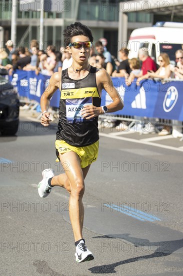 Akira Akasaki (JPN), later runner-up, at KM38 in front of Potsdamer Platz at the 51st BMW Berlin Marathon 2025 on 21/09/2025