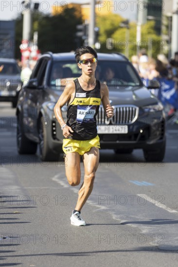 Akira Akasaki (JPN), later runner-up, at KM38 in front of Potsdamer Platz at the 51st BMW Berlin Marathon 2025 on 21/09/2025