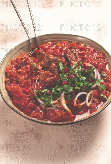 Chashushuli, a traditional Georgian dish, spicy, stewed meat with tomatoes and spices, homemade, no people