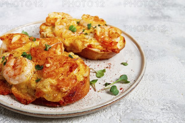 Sandwiches with shrimp and cheese, baked in the oven, with microgreens, breakfast, homemade, no people