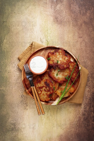 Potato pancakes, pancakes with sour cream, Belarusian dish, homemade, no people
