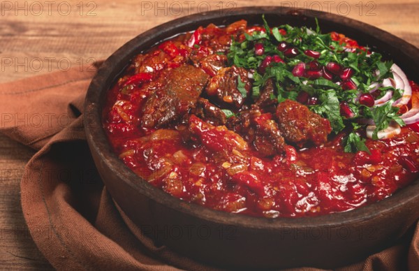 Chashushuli, a traditional Georgian dish, spicy, stewed meat with tomatoes and spices, homemade, no people