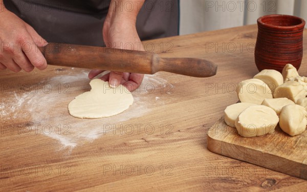 Gyoza dough preparation, in a kitchen setting, gyoza Japanese dumplings, top view, selective focus