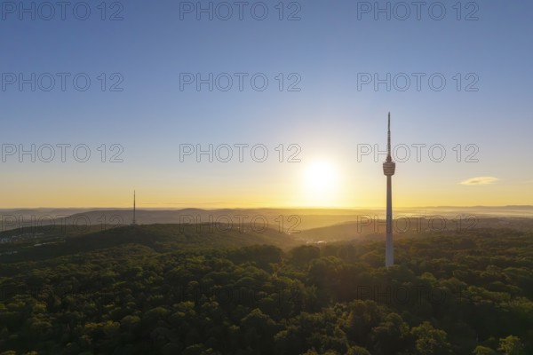 Panoramic view at sunrise, silhouette of the television tower above the woods, Stuttgart, Baden-Württemberg, Germany