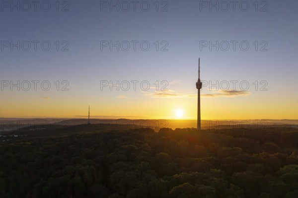 Two towers rise above wooded hills against a twilight sky, Stuttgart, Baden-Württemberg, Germany