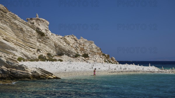 A rocky coastline with clear turquoise waters under a clear blue sky, White Cliffs, White Beach, Makri Aspronisi Island, Natura 2000 area, Boat trip, Aspronisi, Lipsi, Dodecanese, Greek Islands, Greece