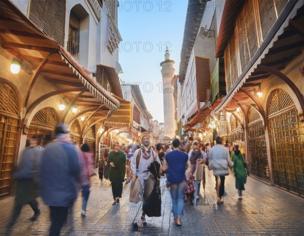 Travelers walk through an scanic architecture and culture of Muslim country, AI generated