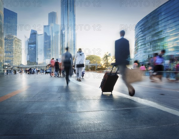 People with luggage walking on a modern city footbridge during sunset, showcasing urban life and travel, AI generated