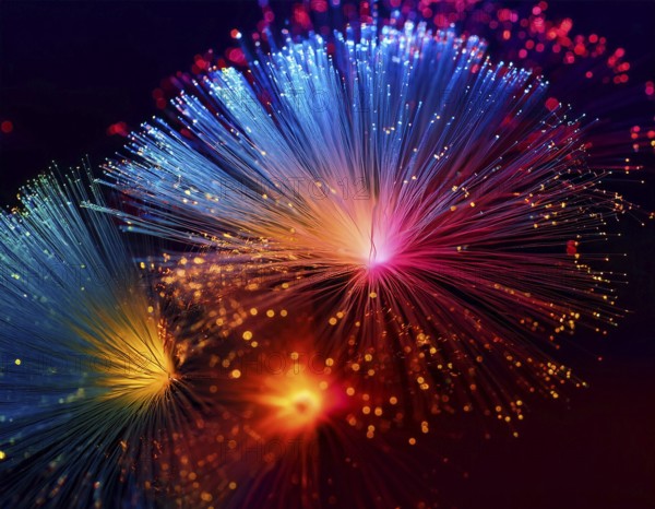 Glowing fiber-optic lights in vivid colors, creating a futuristic and dynamic visual effect, ideal for technology, AI generated