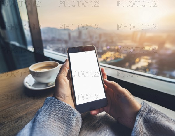 A person holding a smartphone at an outdoor cafe amidst a vibrant and lively urban setting. The image captures a relaxed moment with modern technology interaction and a scenic cityscape, AI generated