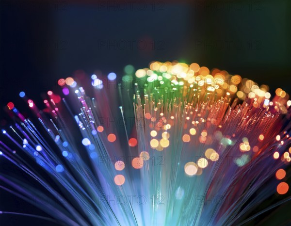 Glowing fiber-optic lights in vivid colors, creating a futuristic and dynamic visual effect, ideal for technology, AI generated